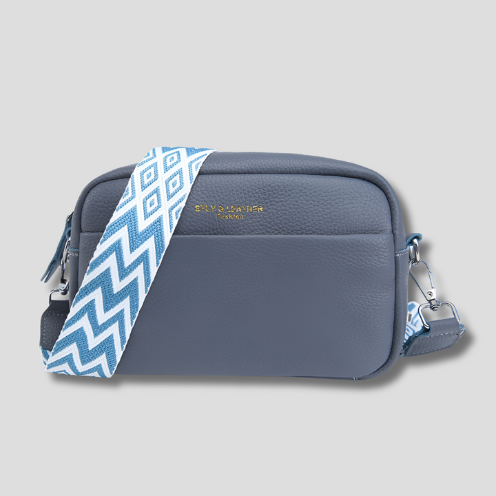 Elegant black women's crossbody bag with a trendy geometric strap. Perfect organized shoulder bag.