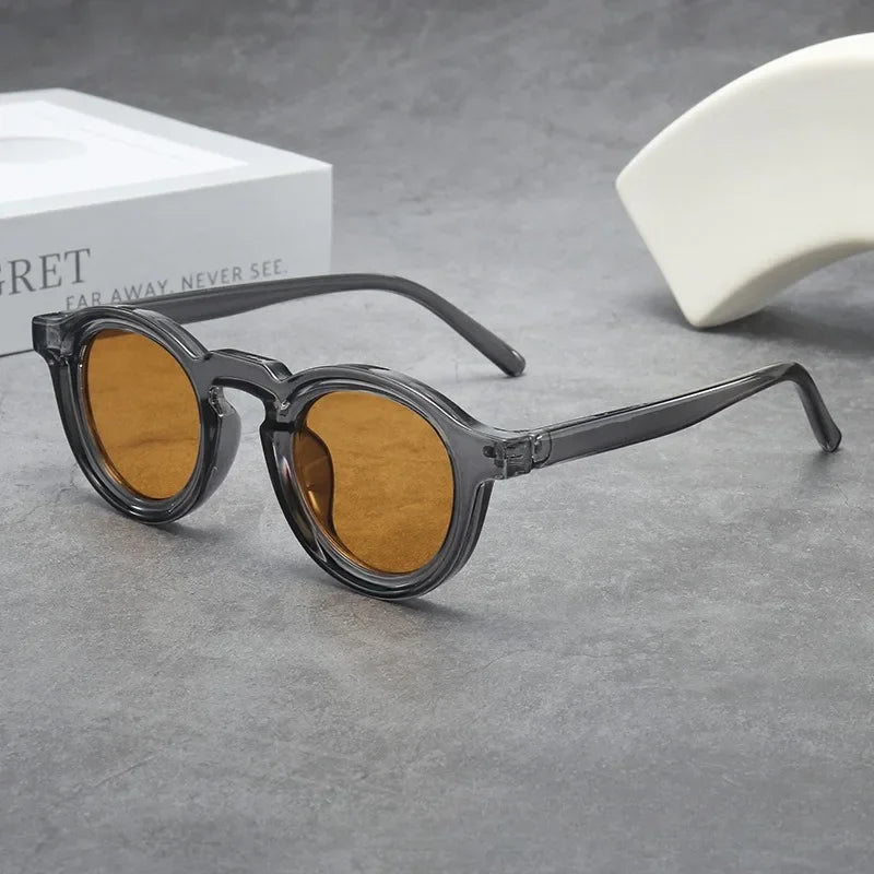Stylish amber round tinted sunglasses for a trendy unisex look. Lightweight everyday eyewear.