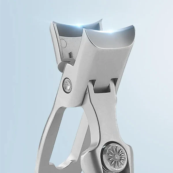 "Ultra sharp nail cutter for thick nails, silver color, ergonomic design, wide jaw, carbon steel blades, beauty tool."