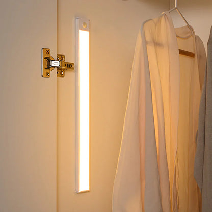 Ultra-slim motion sensor cabinet light in sleek aluminum, black or silver, 9mm thick, 20-60cm, versatile, hands-free.