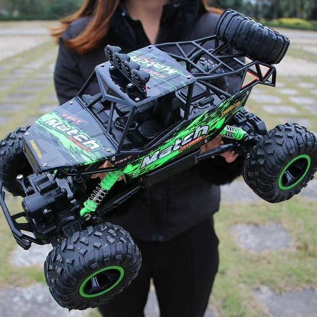 Powerful electric 4WD RC crawler truck, remote control monster vehicle designed for challenging off-road terrains.