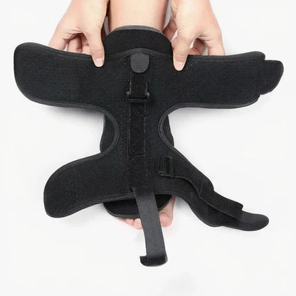 Unisex adjustable night splint for plantar fasciitis relief, black breathable neoprene, metal bands, ergonomic design.