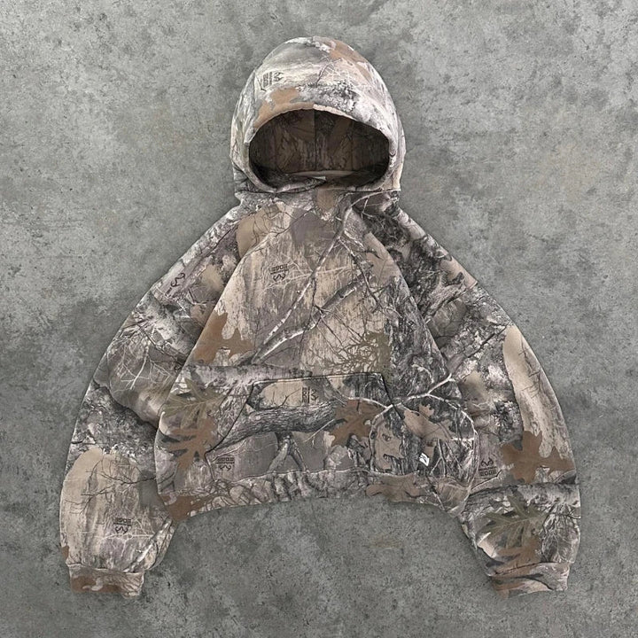 "Unisex camo streetwear hoodie with tactical print, front view. Urban and outdoor style, men's jackets and coats collection."