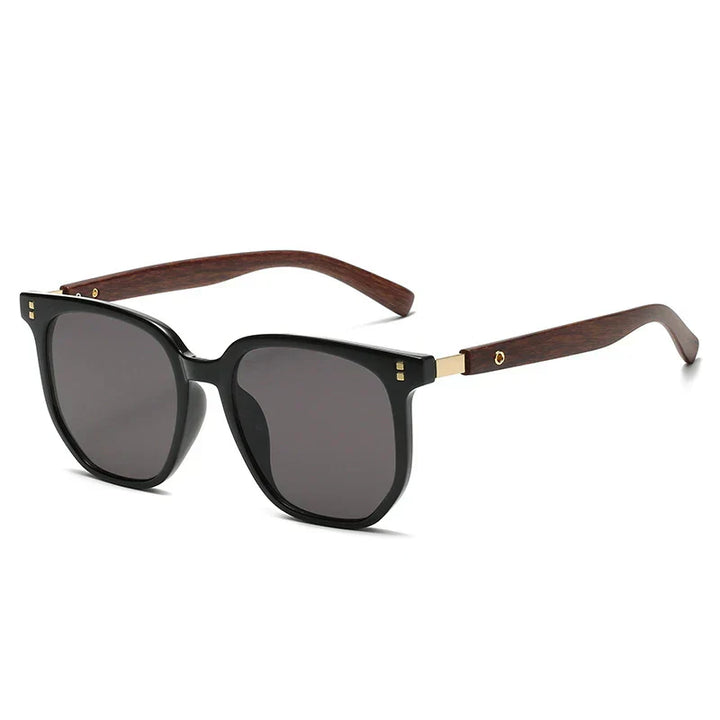Close-up of classic angular unisex sunglasses, black frame, UV400 lens, protective eyewear