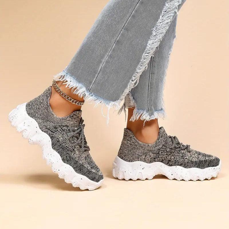 Unisex Everyday Comfort Low-Top Sneakers on a run, demonstrating their performance for athletic casual activities