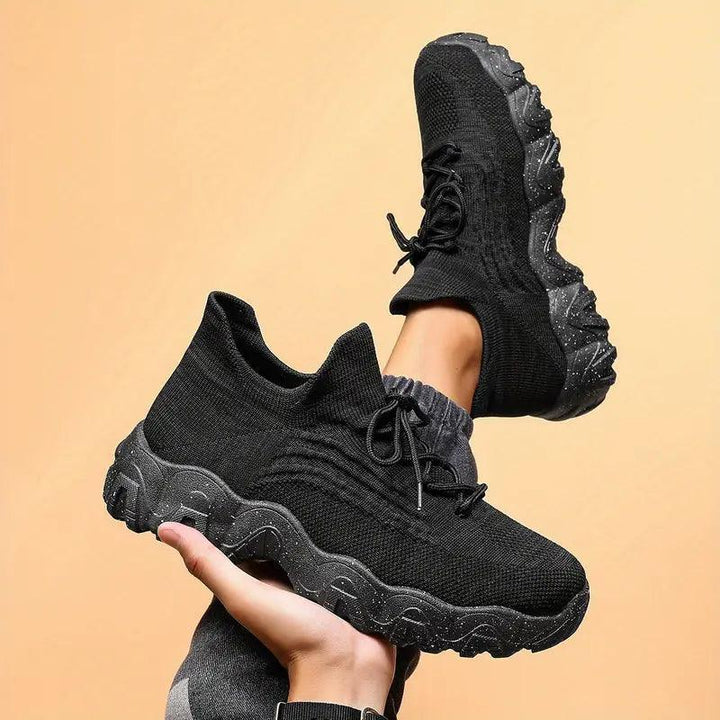 Model wearing Unisex Everyday Comfort Low-Top Sneakers, demonstrating comfort for long hours, like nurse shoes