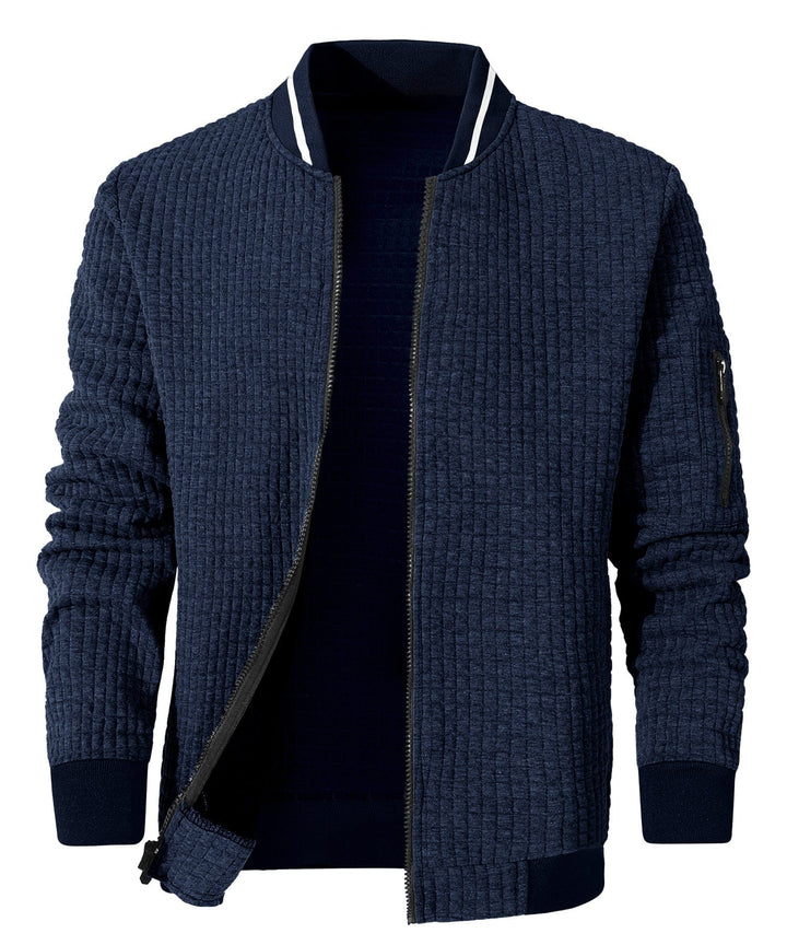 Close-up of the Everyday Jacket's fabric, a durable polyester-cotton blend offering lightweight warmth.