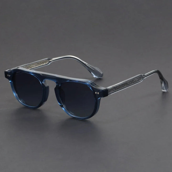 Close-up of Genoa square frame unisex sunglasses, showcasing the black acetate and full UV protection.