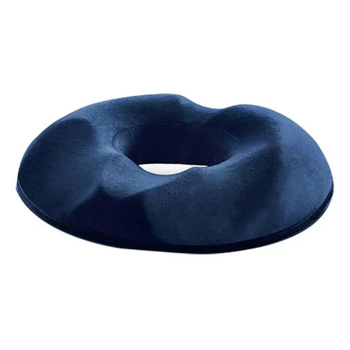 Unisex donut pillow for hemorrhoid, tailbone, & coccyx pain. Memory foam ergonomic design ensures pressure relief.