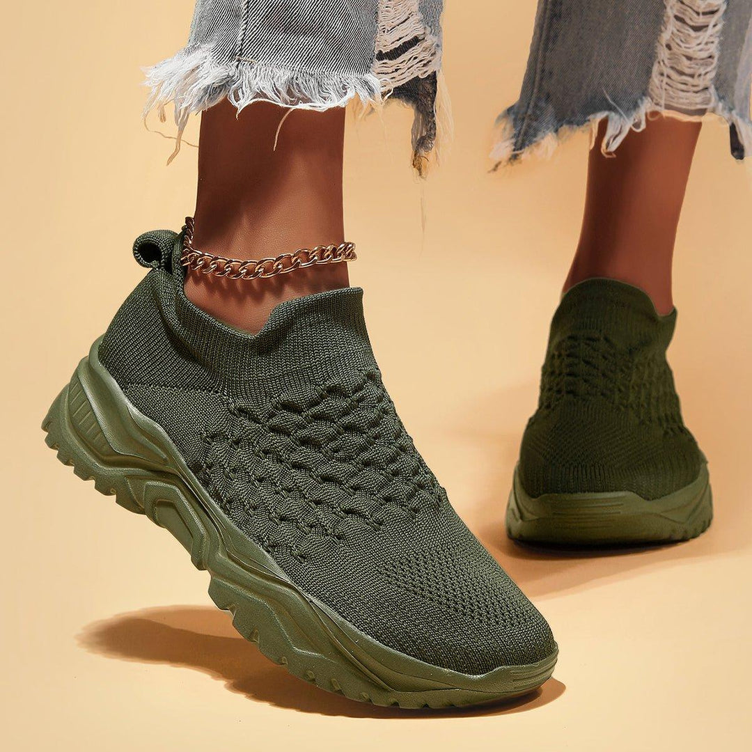 Olive green Ortho Cloud Slip-On Shoes, arranged neatly, ready for comfortable wear