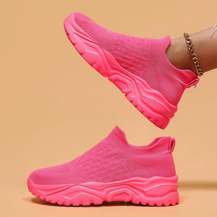 Top-down view of Barbie Pink Ortho Cloud casual footwear, emphasizing slip-on convenience