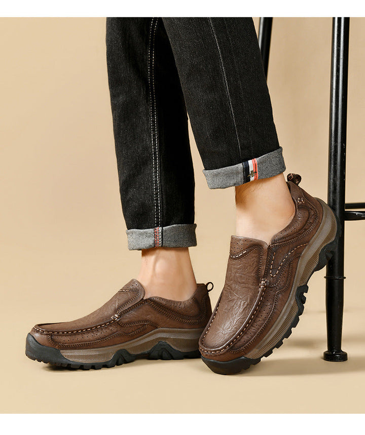 Back view of black leather orthopedic shoes, showcasing the heel support structure