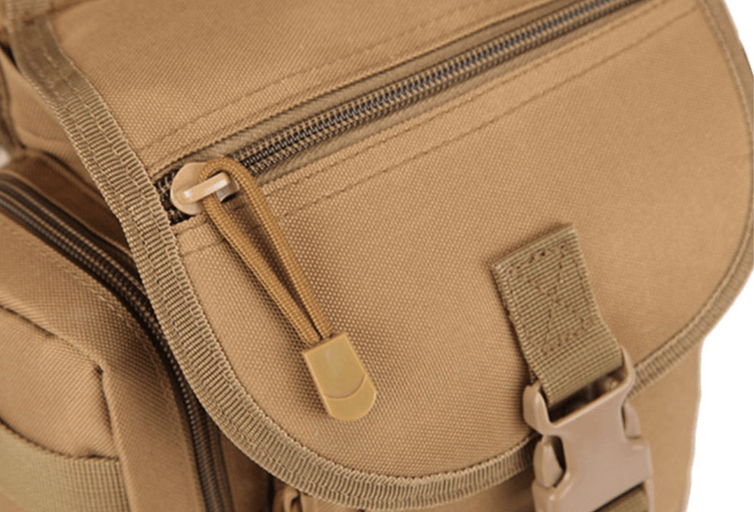 Flat lay of the outdoor thigh bag, showcasing all features: pockets, zippers, and molle webbing