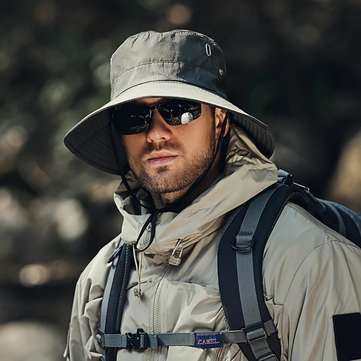 Packable unisex UV protection sun hat with wide brim, ideal for travel, beach days, and hiking adventures.