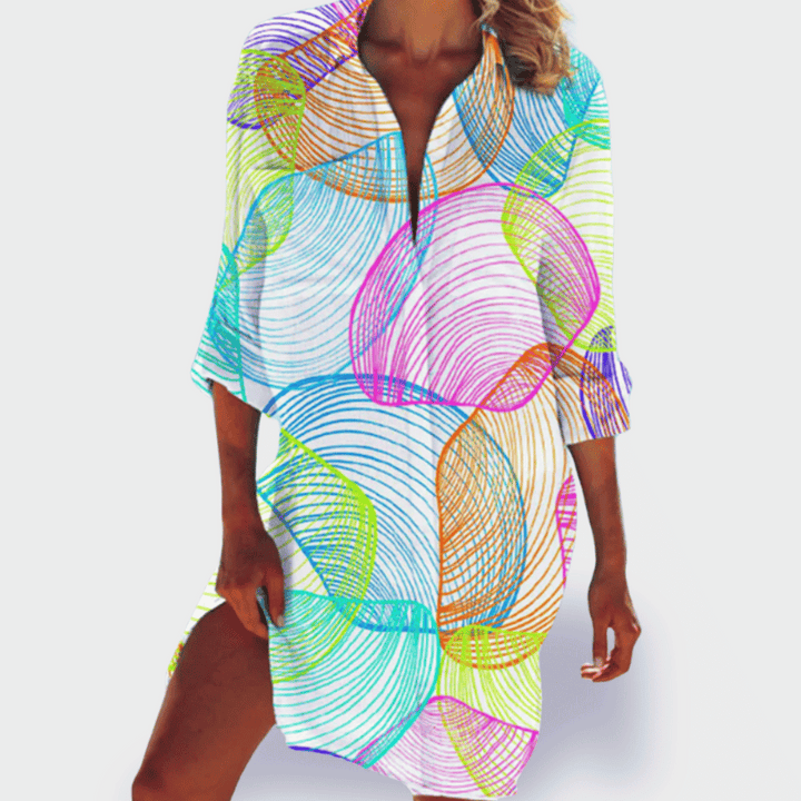 Plus size women's vibrant flowy draped dress. Comfortable and stylish for any summer occasion.