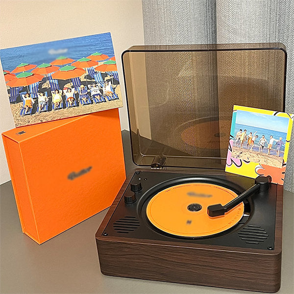 "Vintage-inspired CD player with chrome accents, analog knobs, and LCD display, blending nostalgic design with modern tech."
