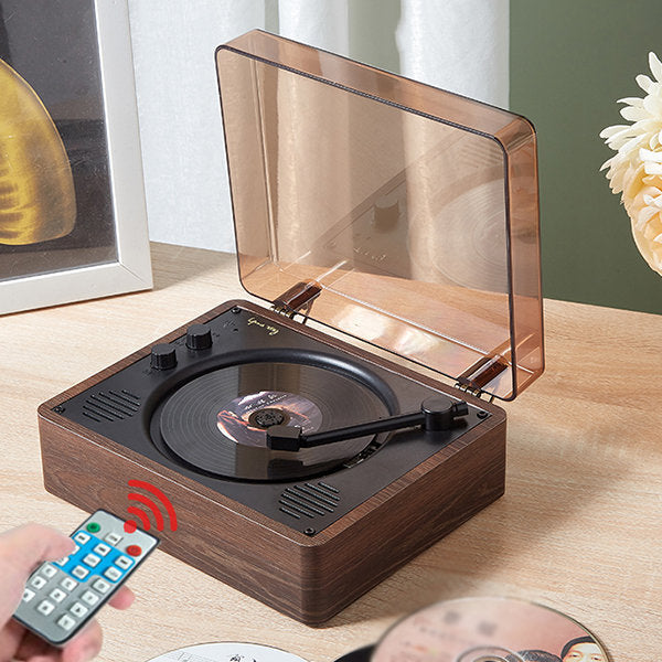 "Vintage-inspired CD player with chrome accents, analog knobs, and LCD display, blending nostalgic design with modern tech."