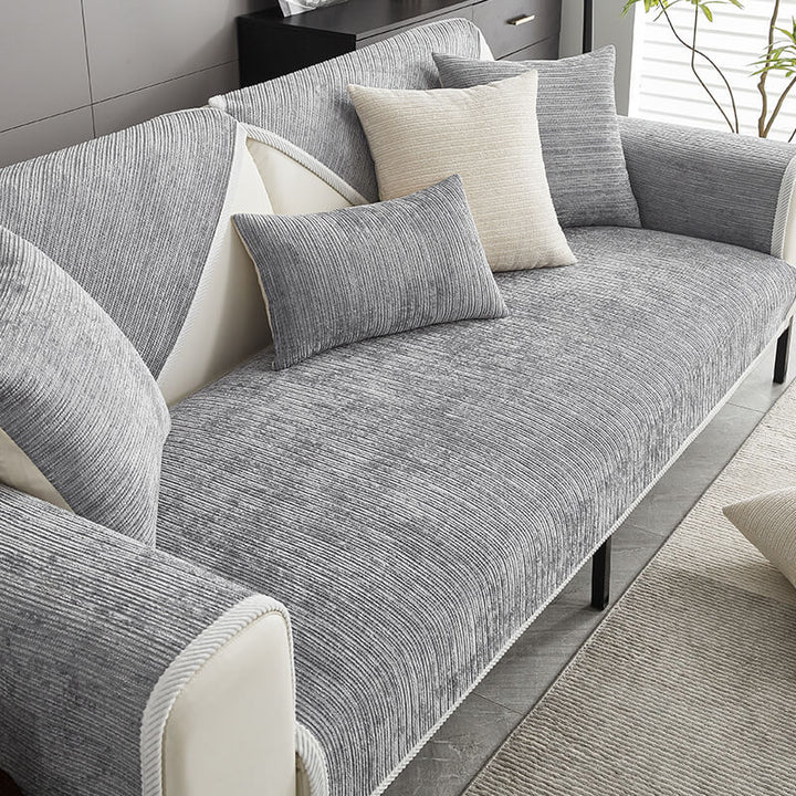 Waterproof sofa cover protects your couch from spills, pets & wear. Non-slip design for living room furniture.