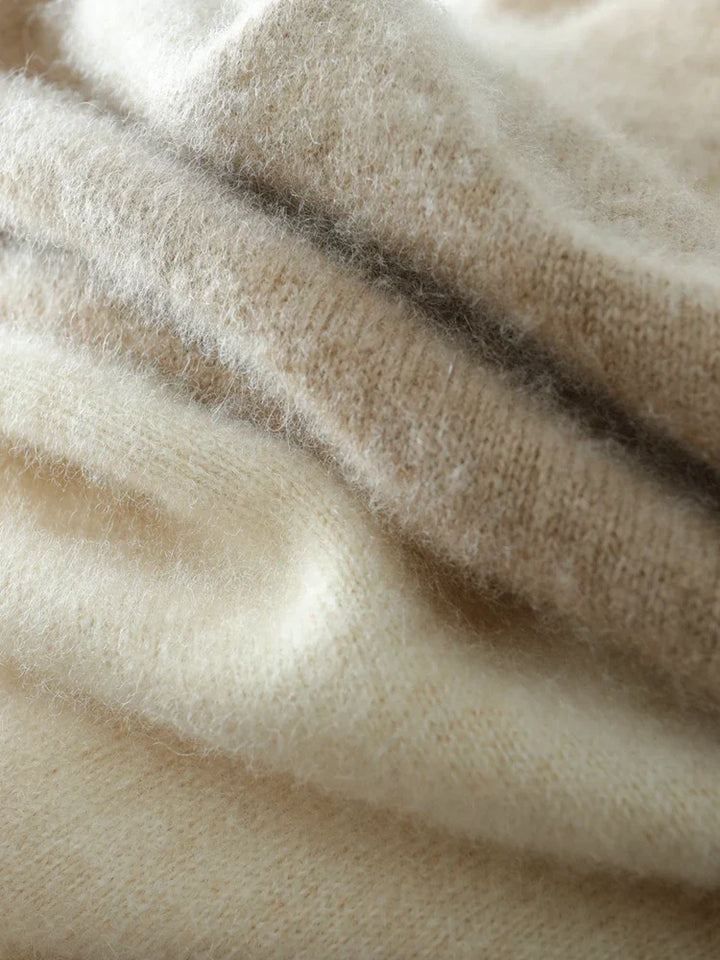 Elegant women's cashmere crossover sweater, luxurious knitwear collection