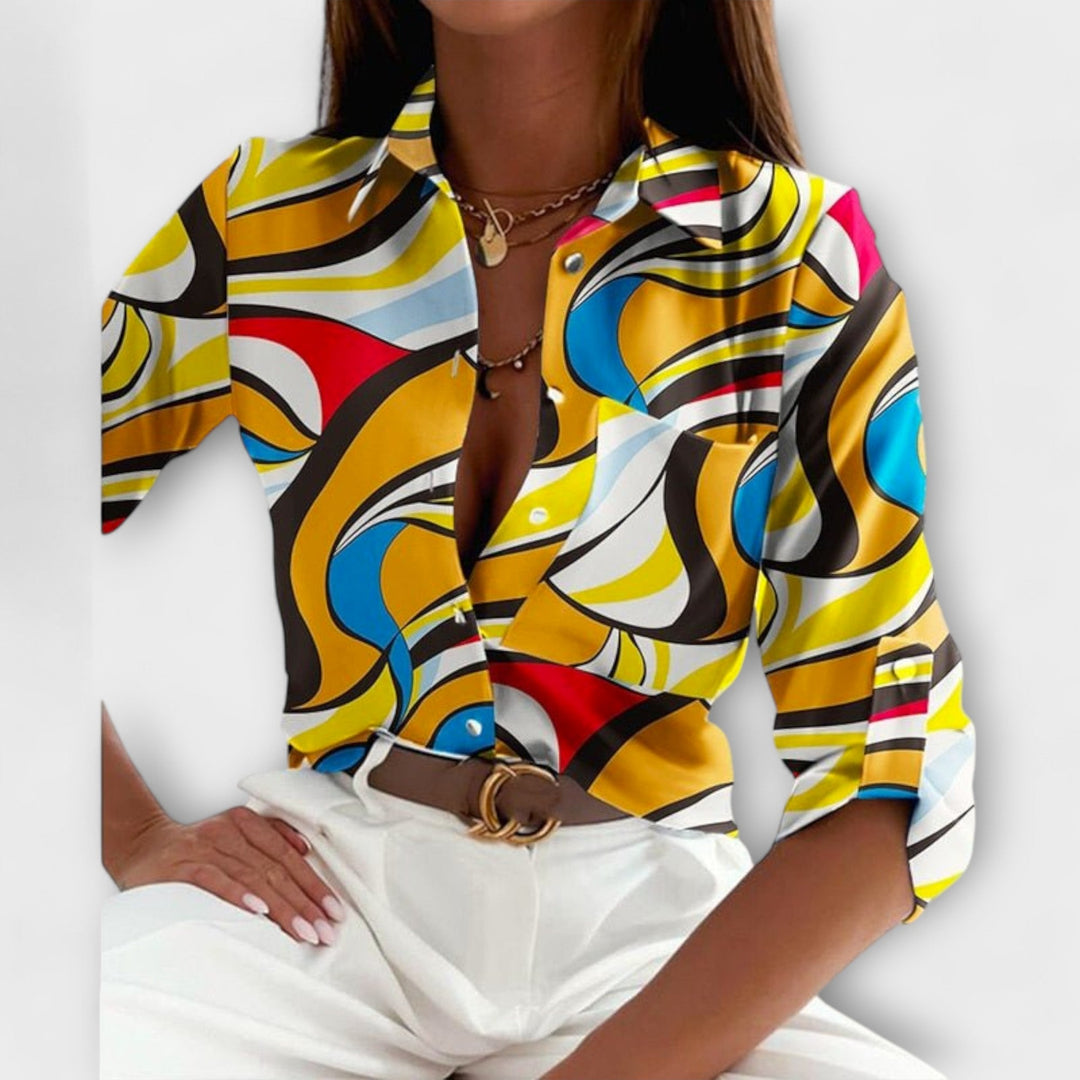 Versatile long sleeve women's abstract print button down blouse for all occasions.
