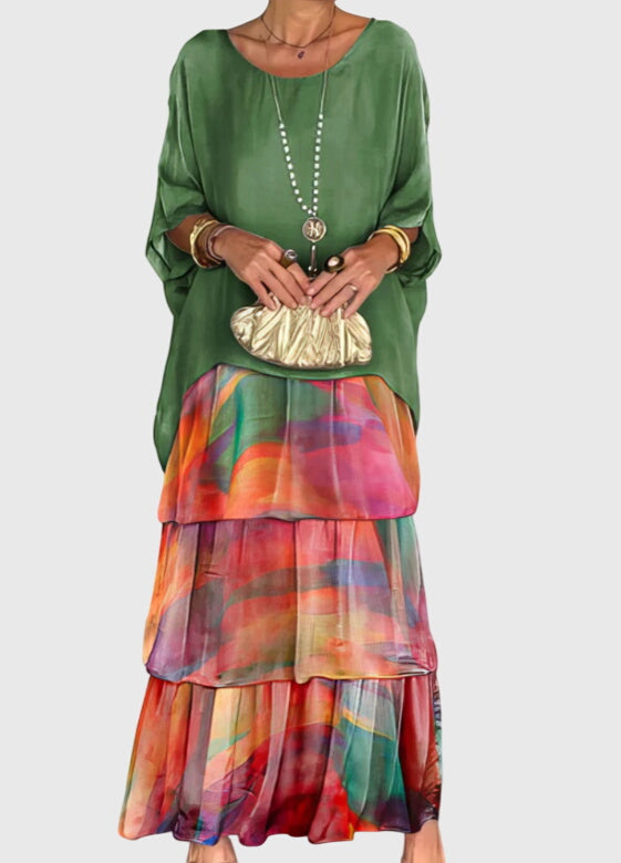 Women's abstract print tiered boho maxi dress, perfect for summer vacations and festivals.