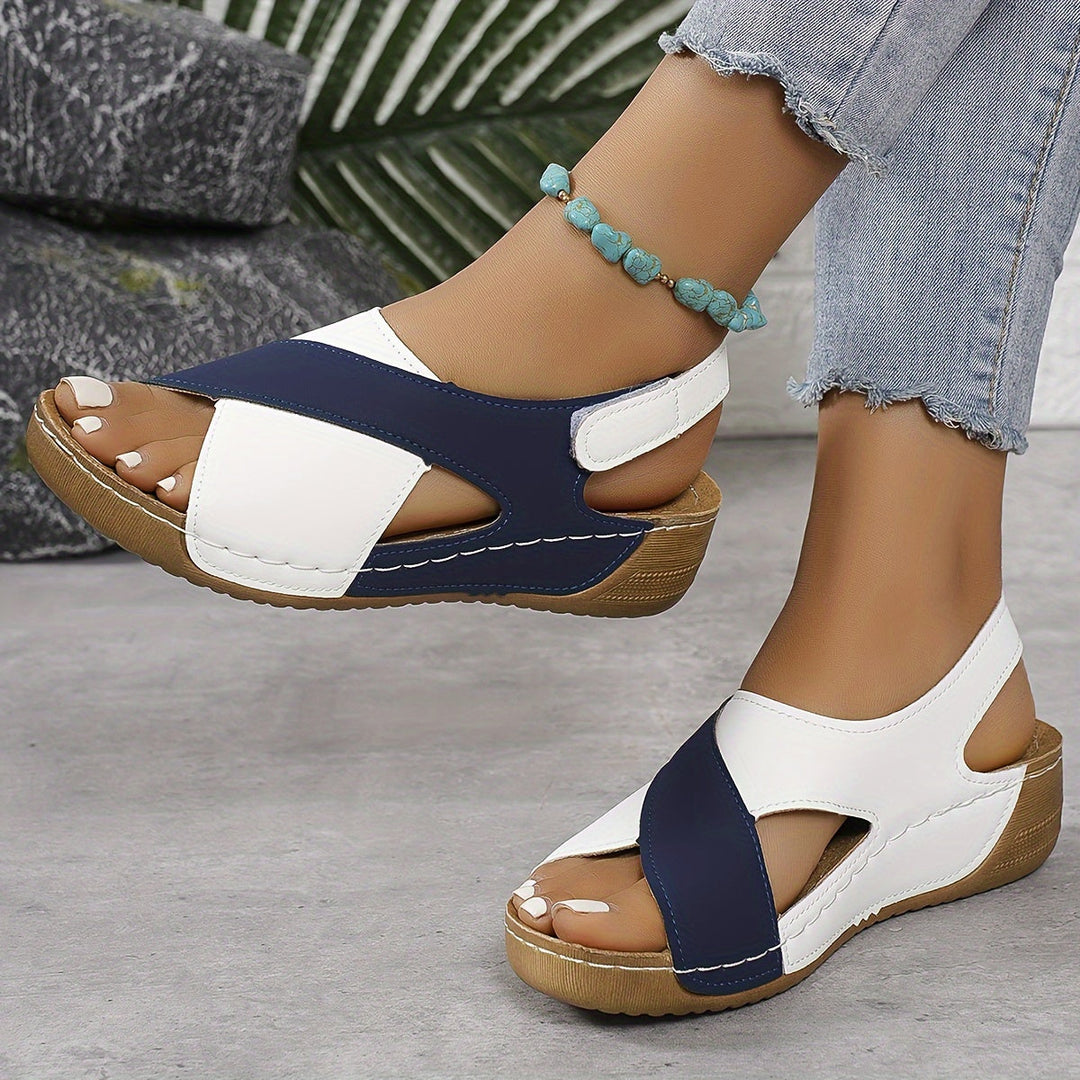 Stylish open-toe women's summer sandals featuring adjustable straps & orthopedic arch support.