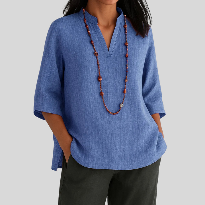Versatile women's loose fit summer blouse. Airy short sleeve top perfect for casual comfort in various colors.