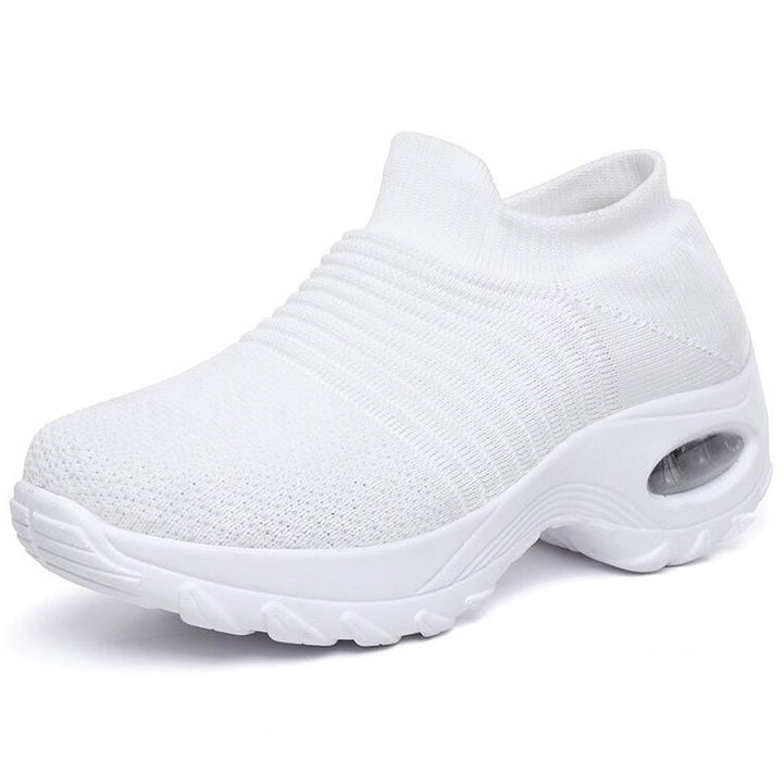 Ergonomic women's sneakers providing excellent arch support & a comfortable fit for walking.