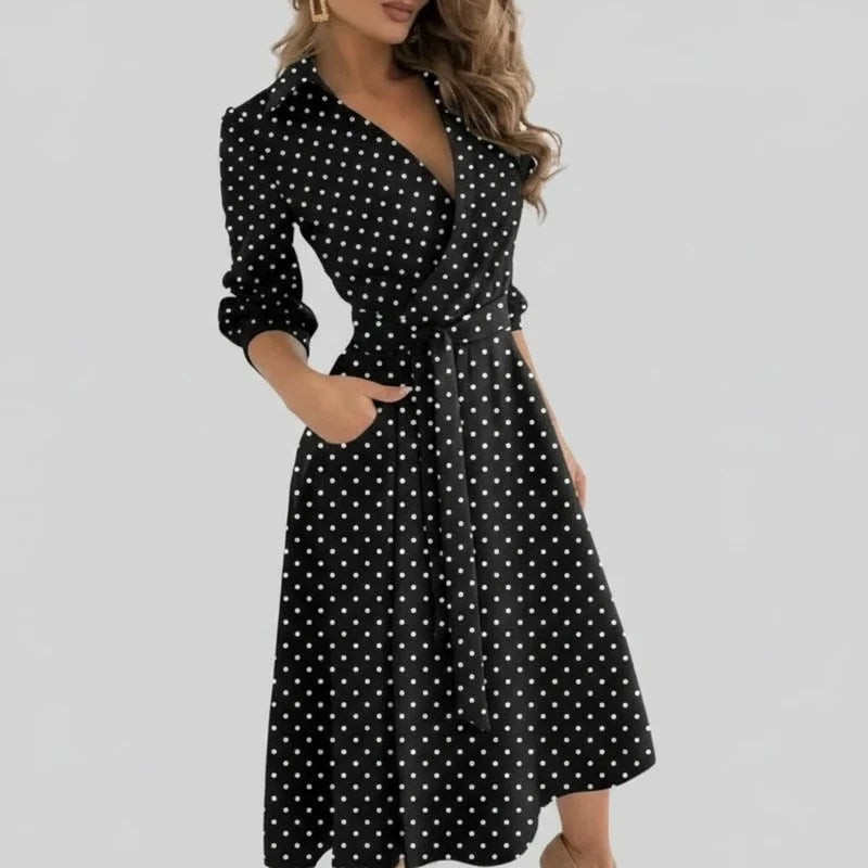 Work-ready women's A-line midi dress with a stylish belt and V-neck. Flattering fit for day or office wear.