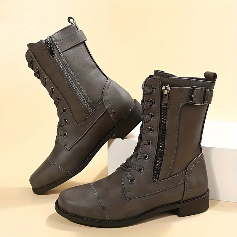 Arrangement of fashion accessories with women's combat boots, emphasizing their place in a stylish outfit.