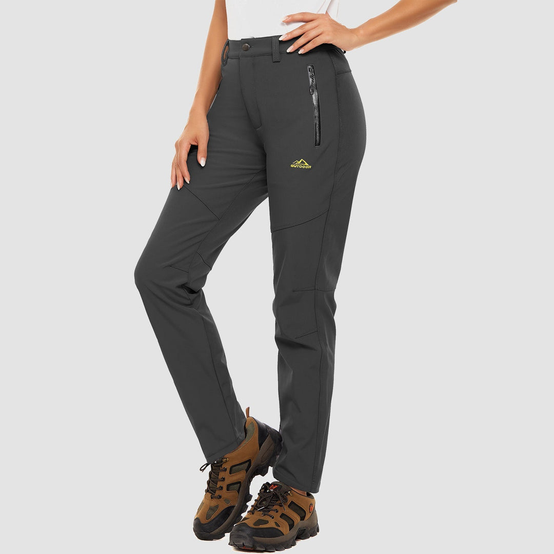 Women's black fleece-lined softshell ski pants, ideal for winter sports