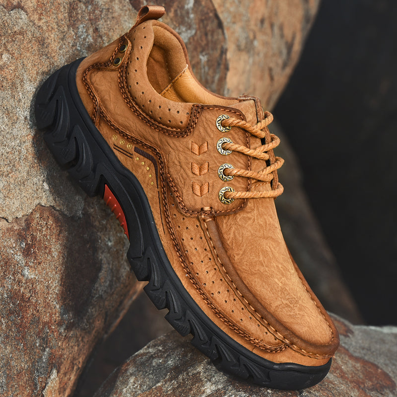 Front view of women's black leather orthopedic boots, offering posture support and style