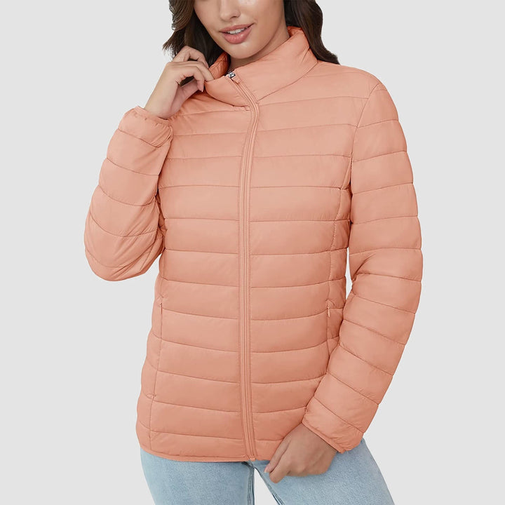 Women's lightweight quilted puffer jacket in a classic fit, a timeless piece of outerwear for spring.