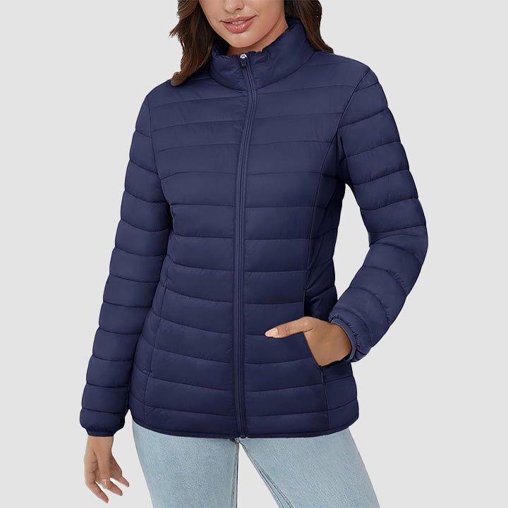 Women's lightweight quilted puffer jacket without a hood, minimalist design for casual spring and fall.