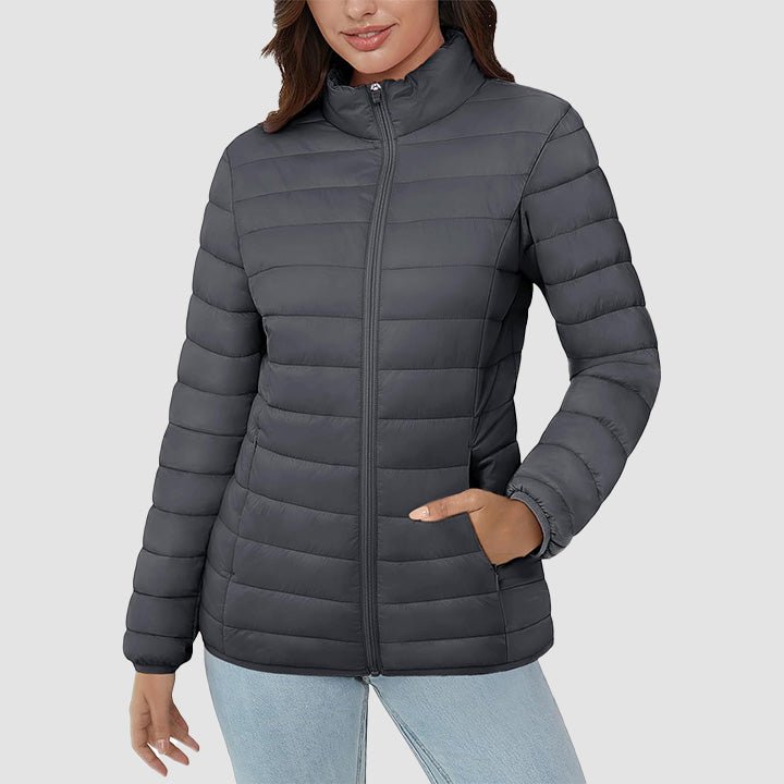Women's lightweight quilted puffer jacket in motion, capturing its comfort and flexibility for daily wear.