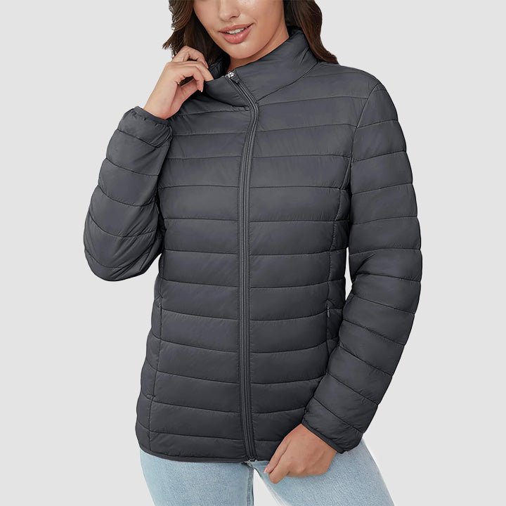 Sustainable women's lightweight quilted puffer jacket, made from recycled materials, eco-friendly outerwear.
