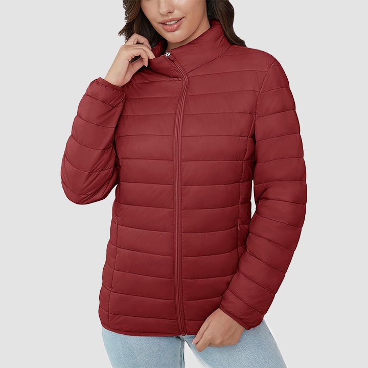Women's lightweight quilted puffer jacket with snap button closure, adding a polished look to fall wear.