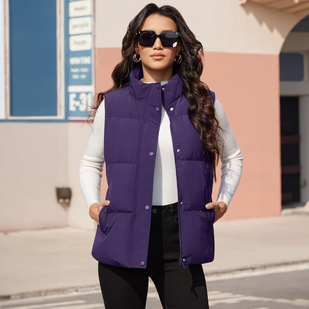 Women's lightweight quilted puffer vest, navy, shown with pockets, practical for fall fashion