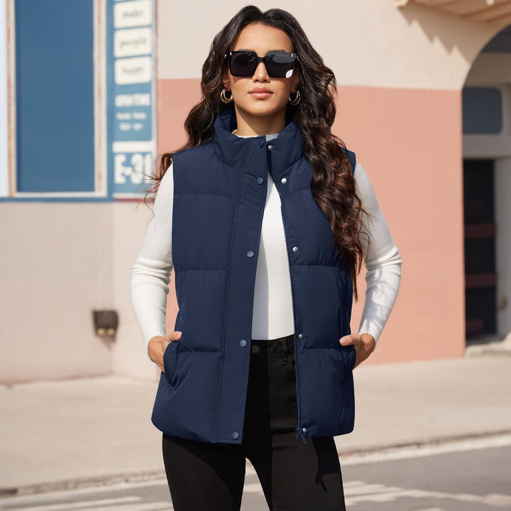 Women's puffer vest in a rich burgundy, quilted, sleeveless, a chic casual vest option