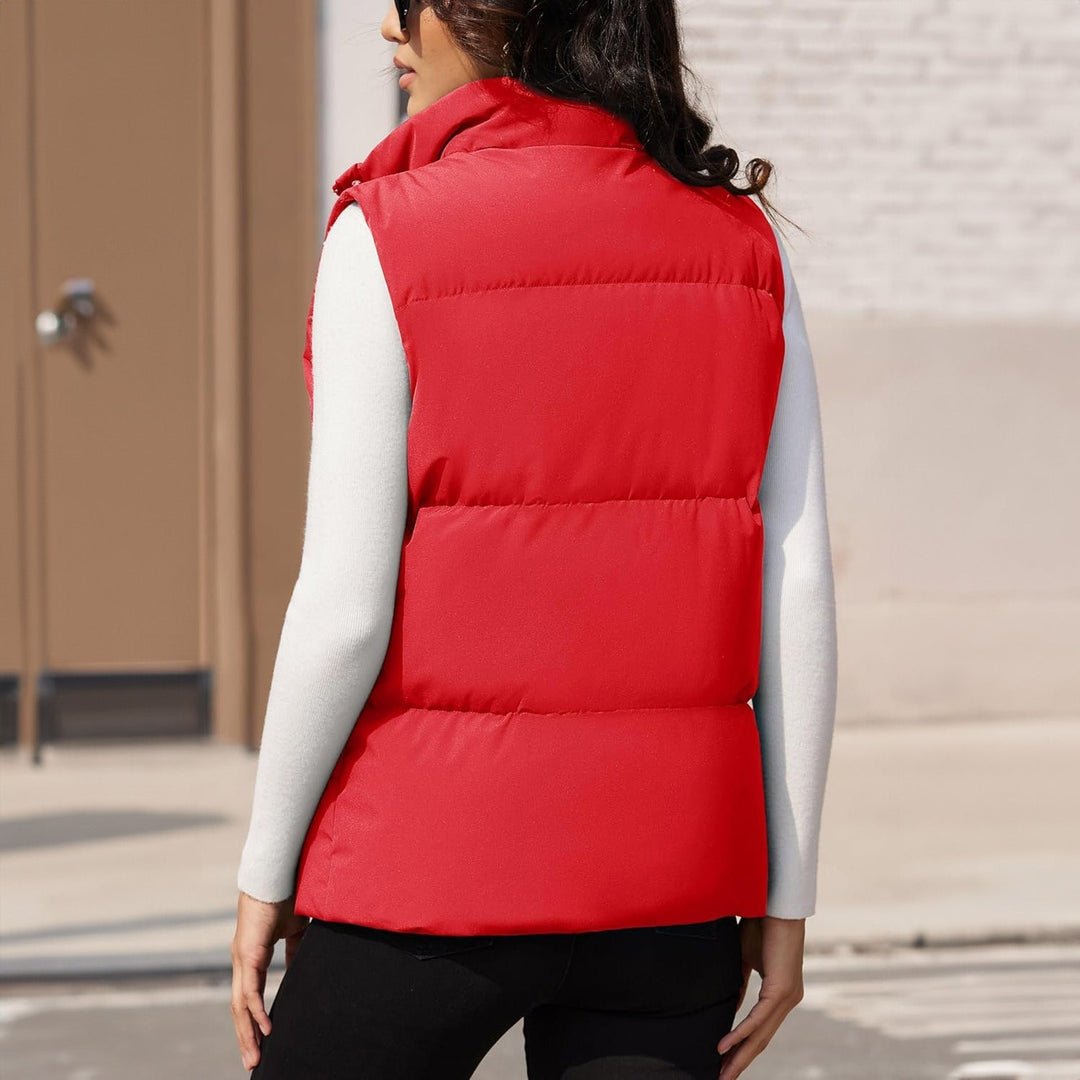 Close-up of the collar on a women's black quilted puffer vest, comfortable sleeveless design