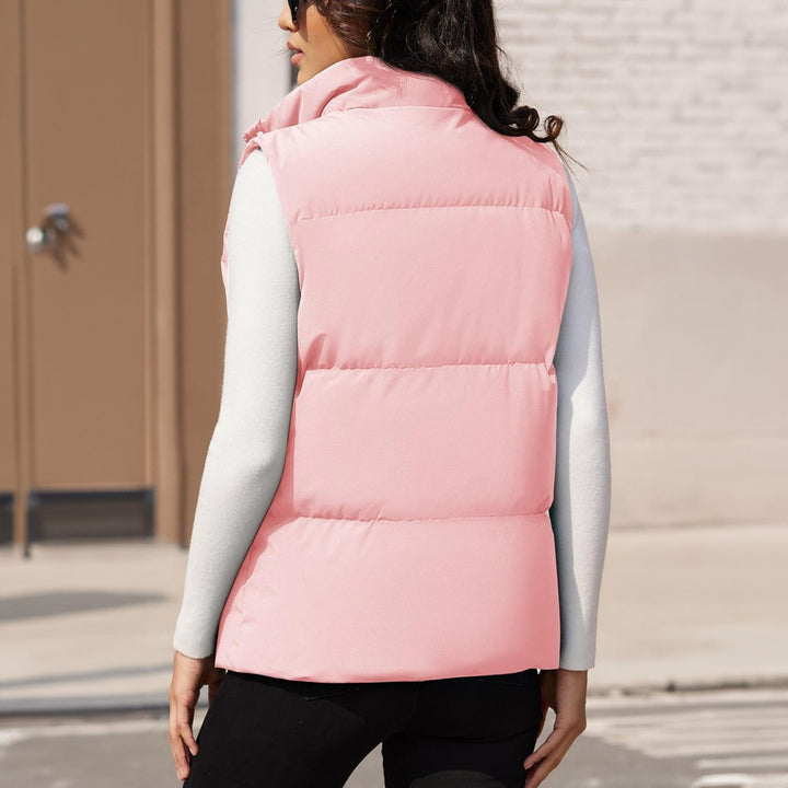 Women's puffer vest in a classic cream, quilted, sleeveless, an elegant casual vest option