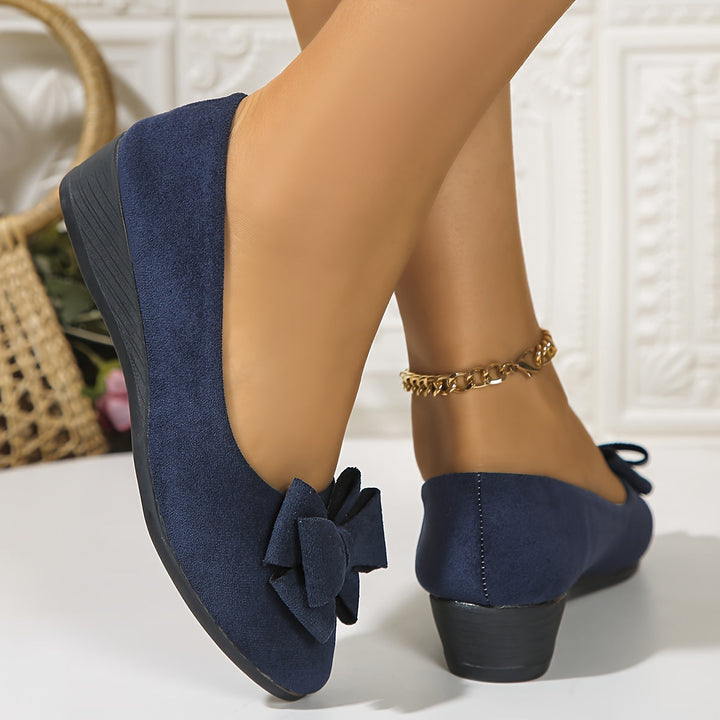 Stylish women's dress flats, bow detail, comfortable wedge, perfect for any occasion.