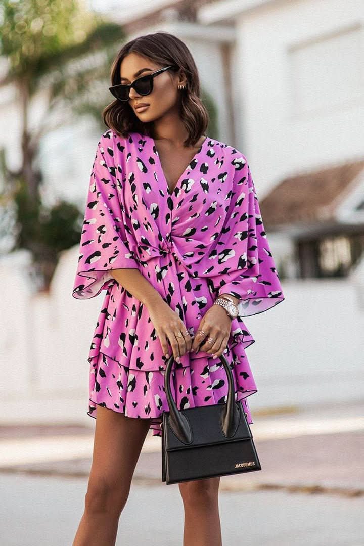 Women's bohemian off-shoulder mini dress. Casual, short, and flowy, suitable for summer festivals.