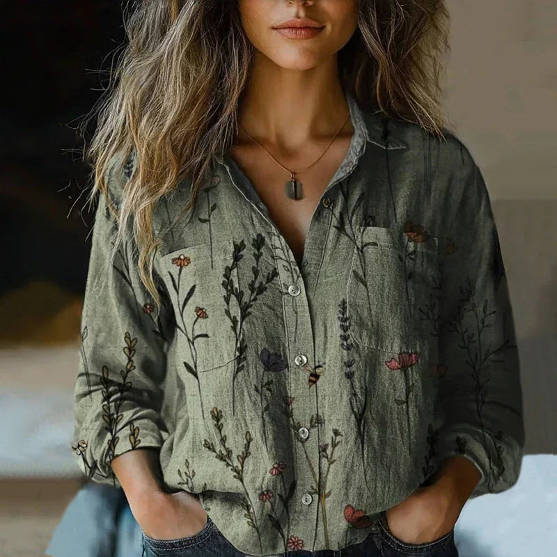 Elegant women's collared v-neck blouse featuring a vintage floral print and long sleeves, ideal for fall outfits.