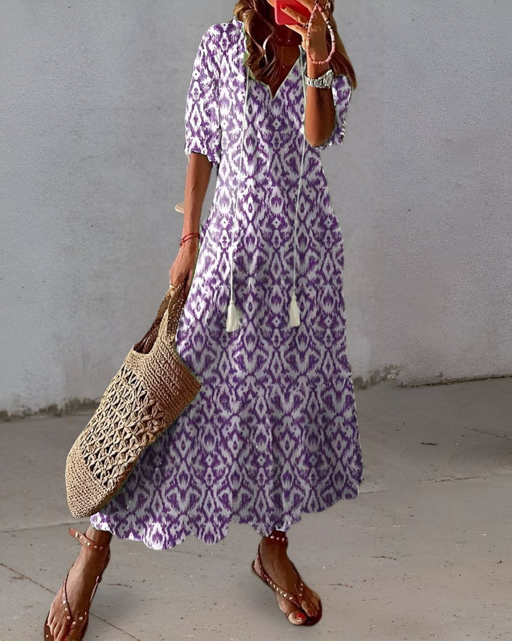 Elegant women's flowy maxi dress with adjustable straps, ideal for casual summer days & beach trips.