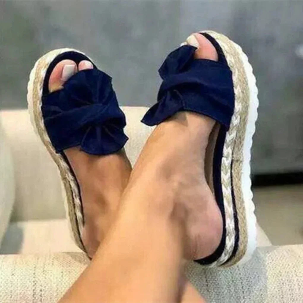 Comfortable open-toe bow platform slides for women, ideal for beach or everyday spring fashion