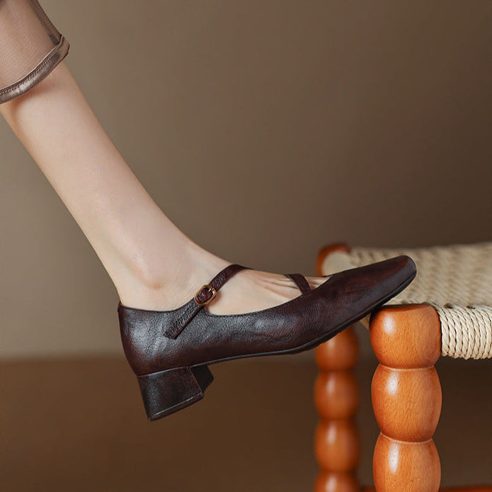 Women's classic leather pumps, burgundy color with a modern tapered heel for elegance