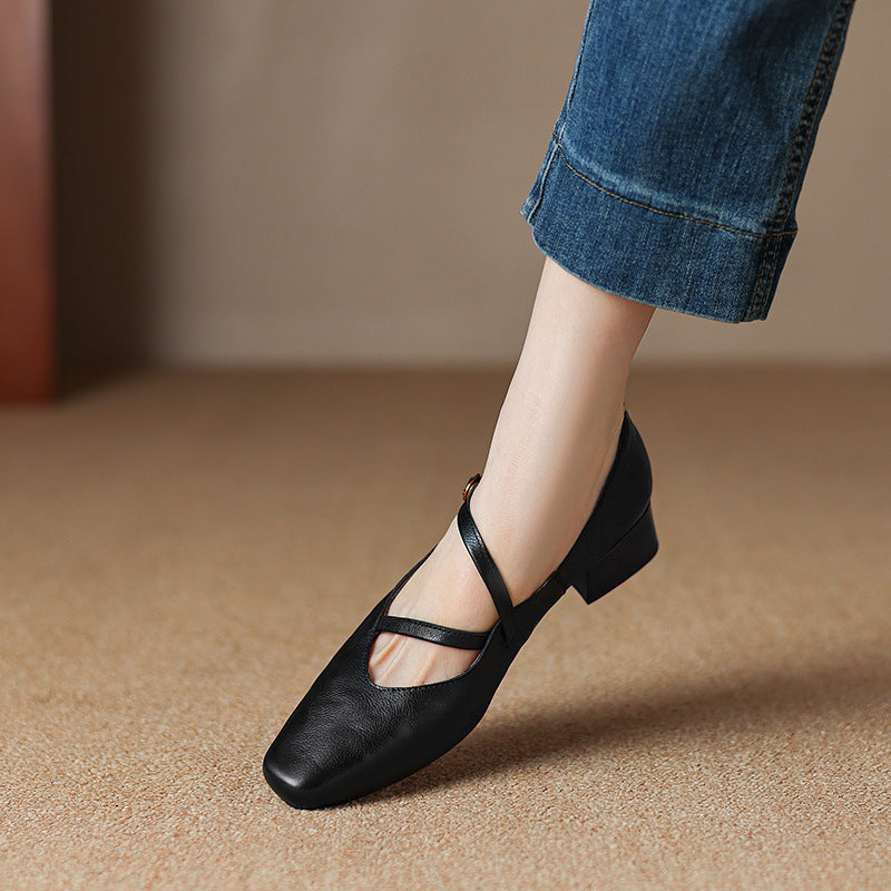 Durable brown leather pumps with a tapered heel, perfect for daily professional wear