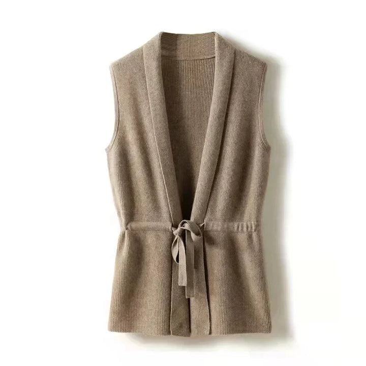 Women's belted knit vest in a rich burgundy cashmere blend, layering essential