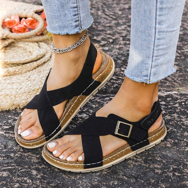 Stylish women's flat sandals, comfortable for everyday casual and summer outings.